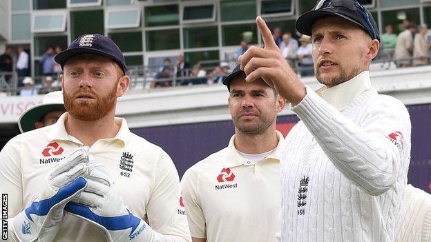 England captain Joe Root with team-mates James Anderson and Jonny Bairstow