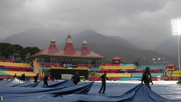 Groundstaff at Dharamsala pull on covers