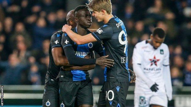 Club Bruges players celebrate scoring a goal against Cercle Bruges on 7 March