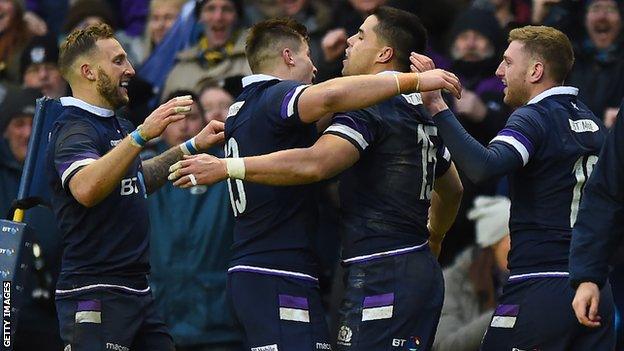 Scotland players celebrate a try against Australia