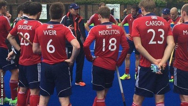 Bobby Crutchley talks to his team