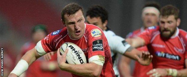 Hadleigh Parkes breaks clear to score Scarlets' opening try against Zebre