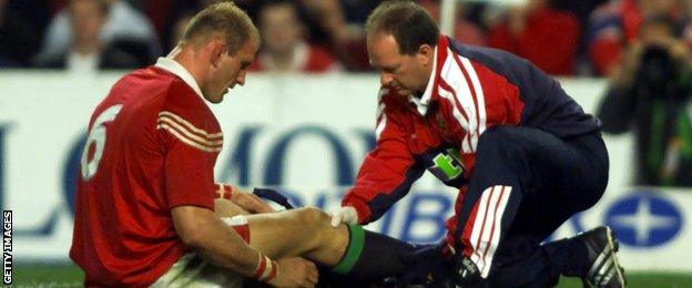 Lawrence Dallaglio gets treatment during the Lions tour of 2001