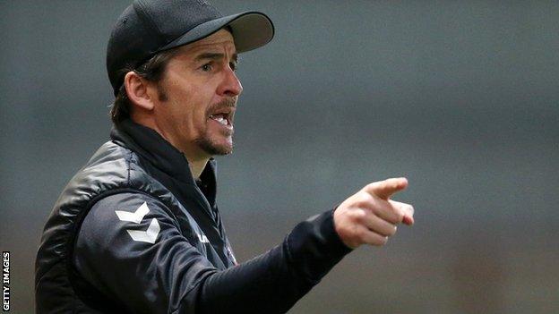 Joey Barton gives instructions to his players