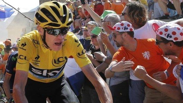 Chris Froome rides up Alpe d'Huez