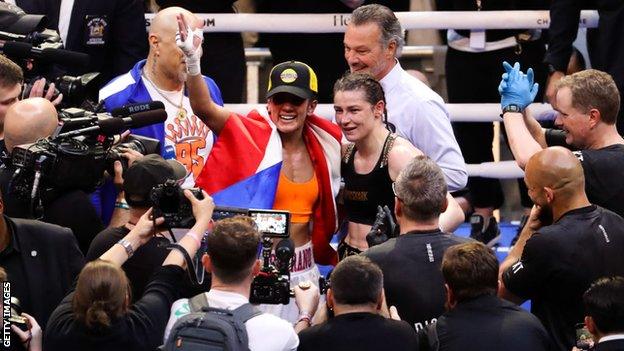 Amanda Serrano and Katie Taylor together in the ring