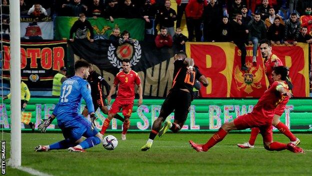 Memphis Depay scores against Montenegro