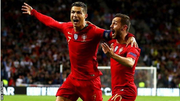 Bernardo Silva and Cristiano Ronaldo celebrate in the Nations League semi-finals