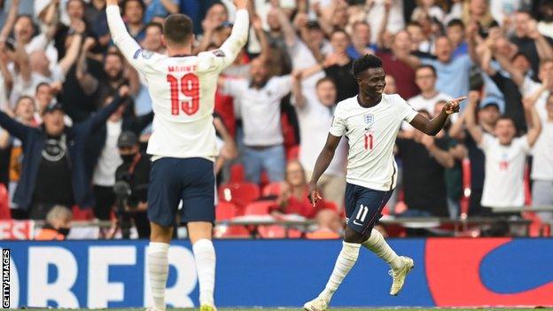 Bukayo Saka celebrates scoring for England against Andorra in a World Cup qualifying match