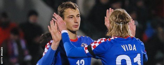 Marko Leskovic (left) celebrates with Croatia