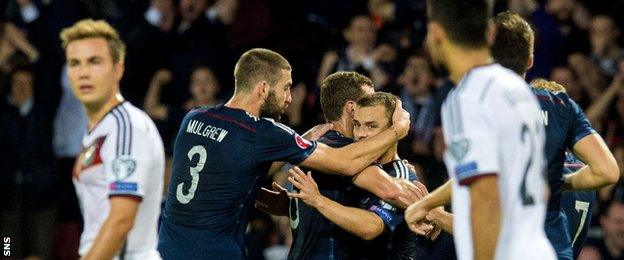 Scotland's Shaun Maloney scores against Germany