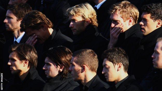 Enke's Germany team-mates at a memorial service at Hannover's stadium on 15 November 2009