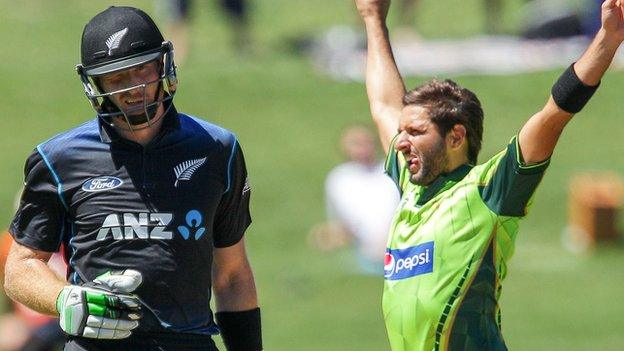 New Zealand's Martin Guptill and Pakistan's Shahid Afridi