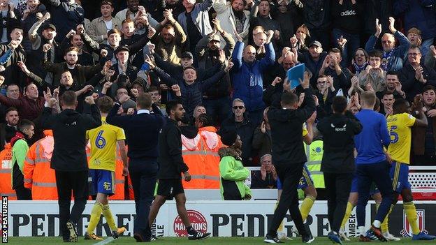 Garry Monk and Birmingham City players take the applause from fans at full-time at Stoke