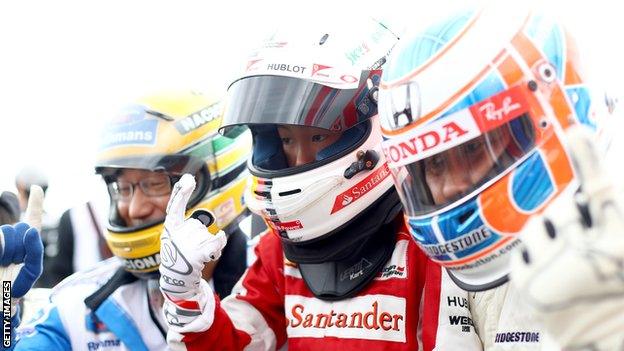 Fans in race suits at the Japanese GP