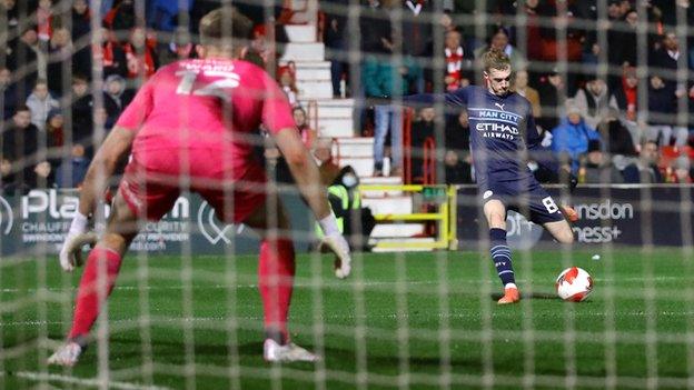 Cole Palmer scores Manchester city's fourth against Swindon