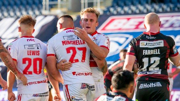 Hull KR celebrate a try against Wigan