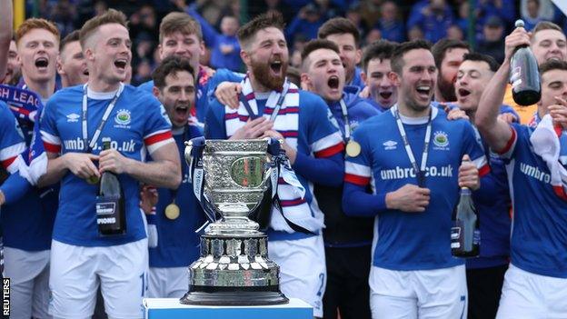 Linfield celebrate winning the Gibson Cup in April after a thrilling title tussle with Crusaders