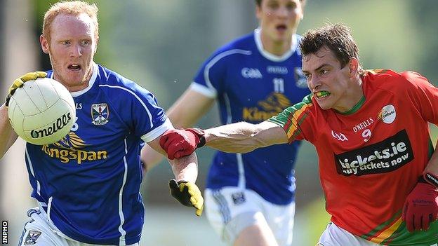 Cavan's Cian Mackey in possession against Sean Gannon of Carlow