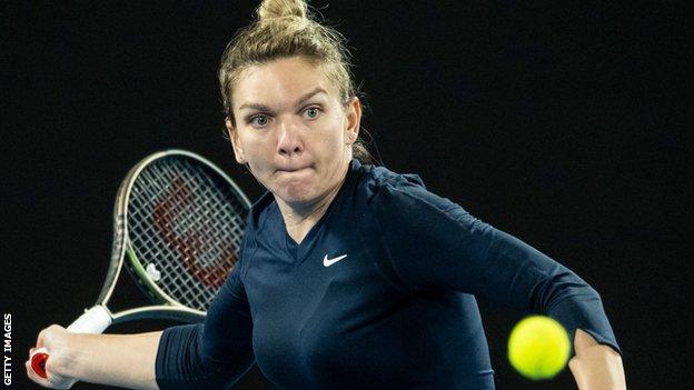 Simona Halep hits a return in her win over Viktorija Golubic in Melbourne