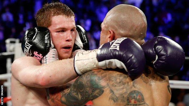 Cotto and Canelo Alvarez embrace
