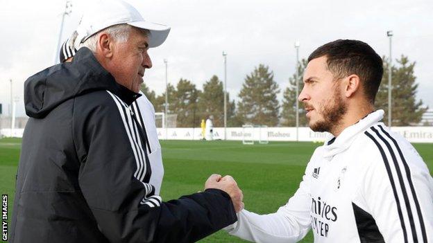 Eden Hazard shakes Carlo Ancelotti's hand