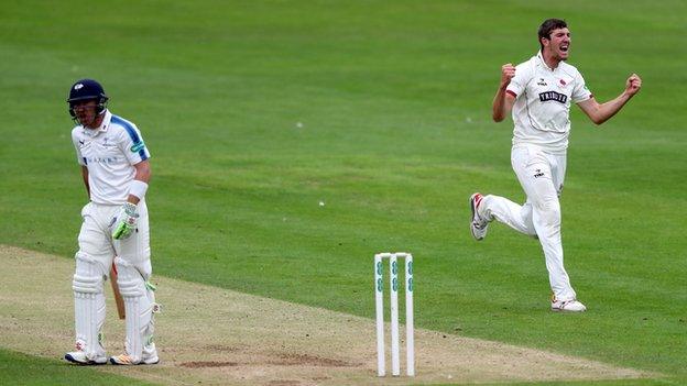 Craig Overton celebrates taking the wicket of Andy Hodd