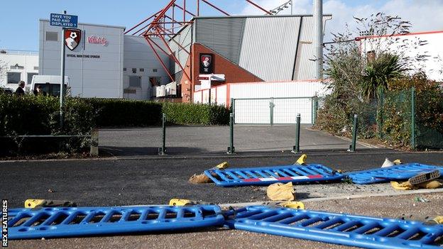 Signs of the effects of Storm Eunice outside Bournemouth's Vitality Stadium