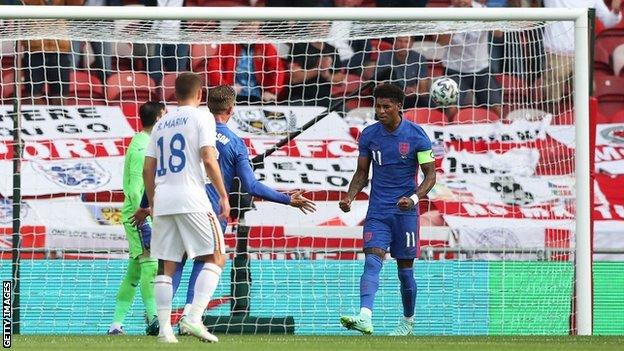 Marcus Rashford celebrates scoring for England against Romania