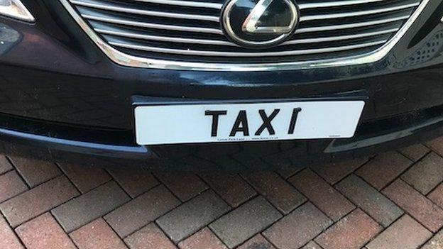 Taxi registration plate