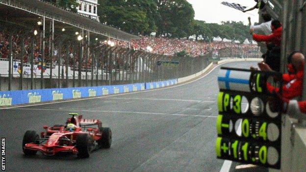 Felipe Massa crosses the line to win the 2008 Brazilian GP, when he so narrowly missed out on the world title