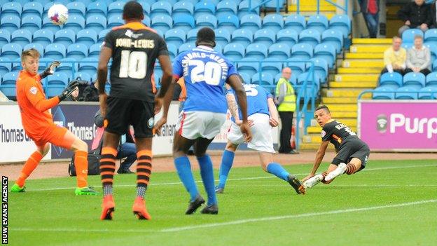 Tyler Blackwood stoops to score for Newport County at Carlisle United on his debut