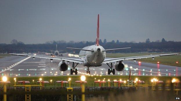 A plane landing at Gatwick