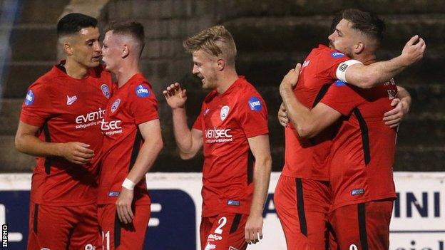 Coleraine players celebrate