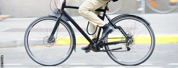 Cyclist in a suit