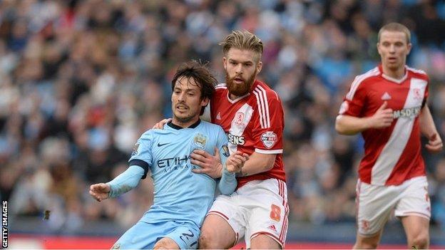 Adam Clayton and David Silva