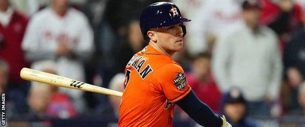 Houston Astros' Alex Bregman hits a two-RBI double