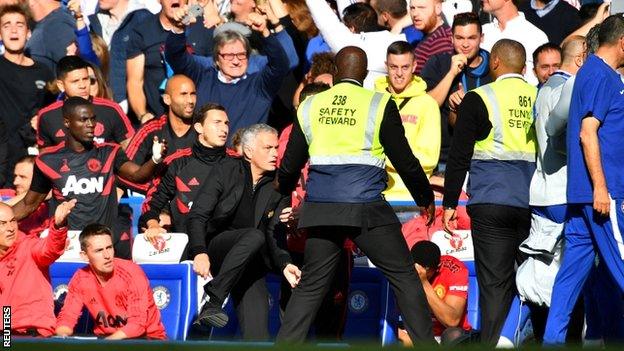 Jose Mourinho (centre) reacts to Chelsea coach Marco Ianni's celebration