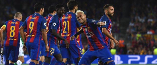 Neymar punches the air after scoring the third goal at Camp Nou