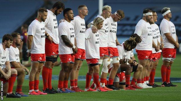 Sale players in anti-racism t-shirts