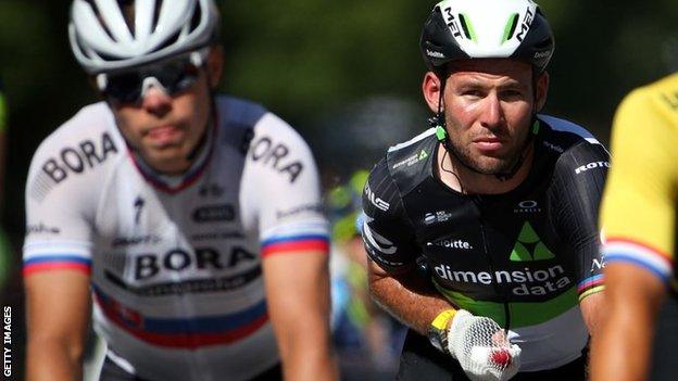 Mark Cavendish makes his way slowly over the line at the end of stage four