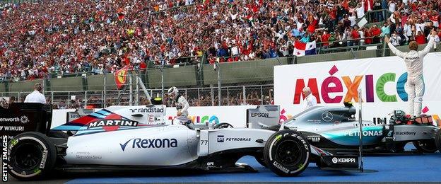 Nico Rosberg salutes the grandstands as the celebrations begin in Mexico