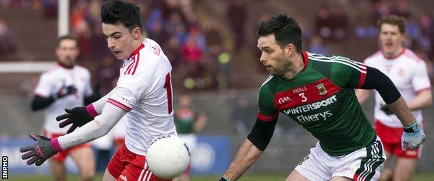 Lee Brennan beat Mayo full-back Ger Cafferkey to score Tyrone's opening goal