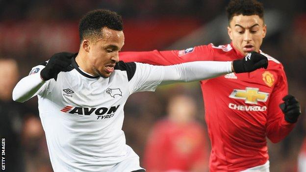 Marcus Olsson (left) tussles with Jesse Lingard of Manchester United