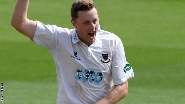 Ollie Robinson celebrates a wicket for Sussex