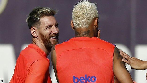 Barcelona's Lionel Messi (left) in training