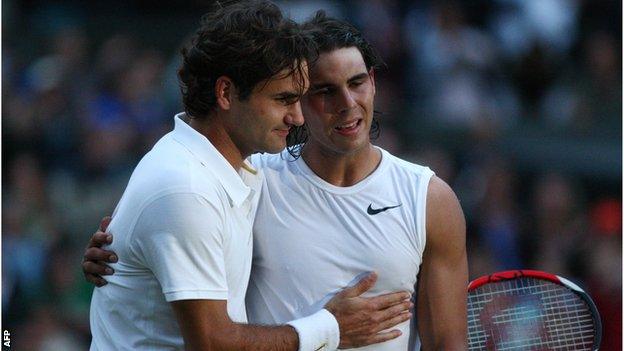 Roger Federer and Rafael Nadal embrace after the 2008 Wimbledon men's singles final