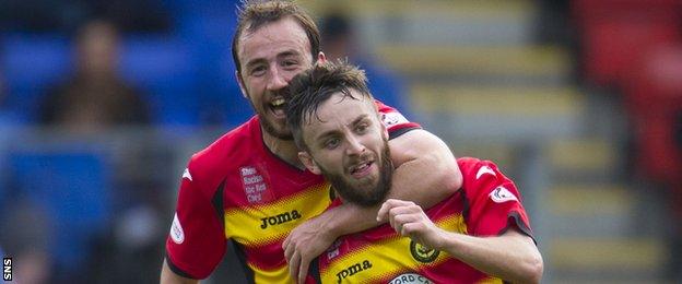 Stuart Bannigan and Steven Lawless celebrate with Partick Thistle