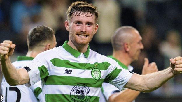 Celtic right-back Anthony Ralston celebrates his side's win over AIK