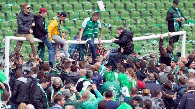 Werder Bremen fans celebrate survival